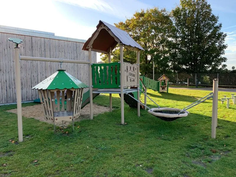 Hanok adventure play structure in a mixed playground Hanok adventure play structure in a mixed playground